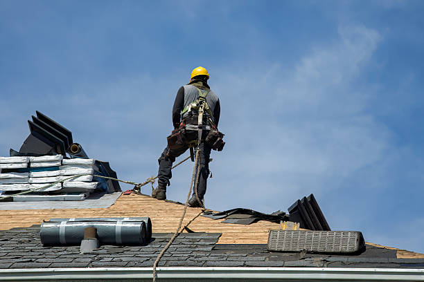 Professional Roof Replacement technician working in Bedford, NH